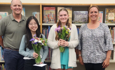 Seniors Jennifer Yu and Chloe Bentley were the recipients of the 2025 Parker and McCarthy Middle School scholarships. Pictured, left to right are Parker Middle School principal Josh Blagg, Yu, Bentley and McCarthy Middle School Assistant Principal Kerry Calobrisi.