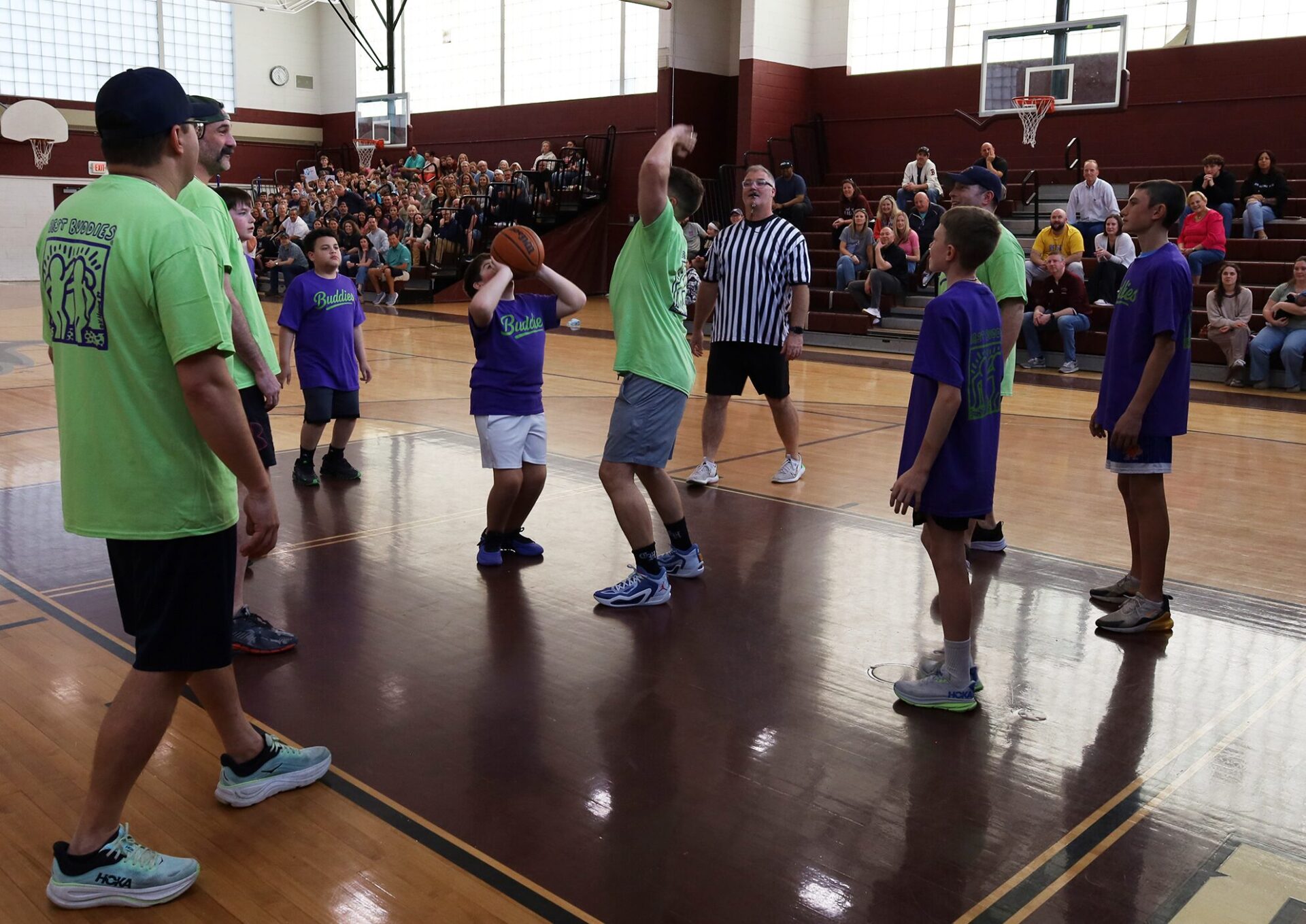 Action from the second annual Buddies vs. Badges charity basketball game on April 16, 2026.
