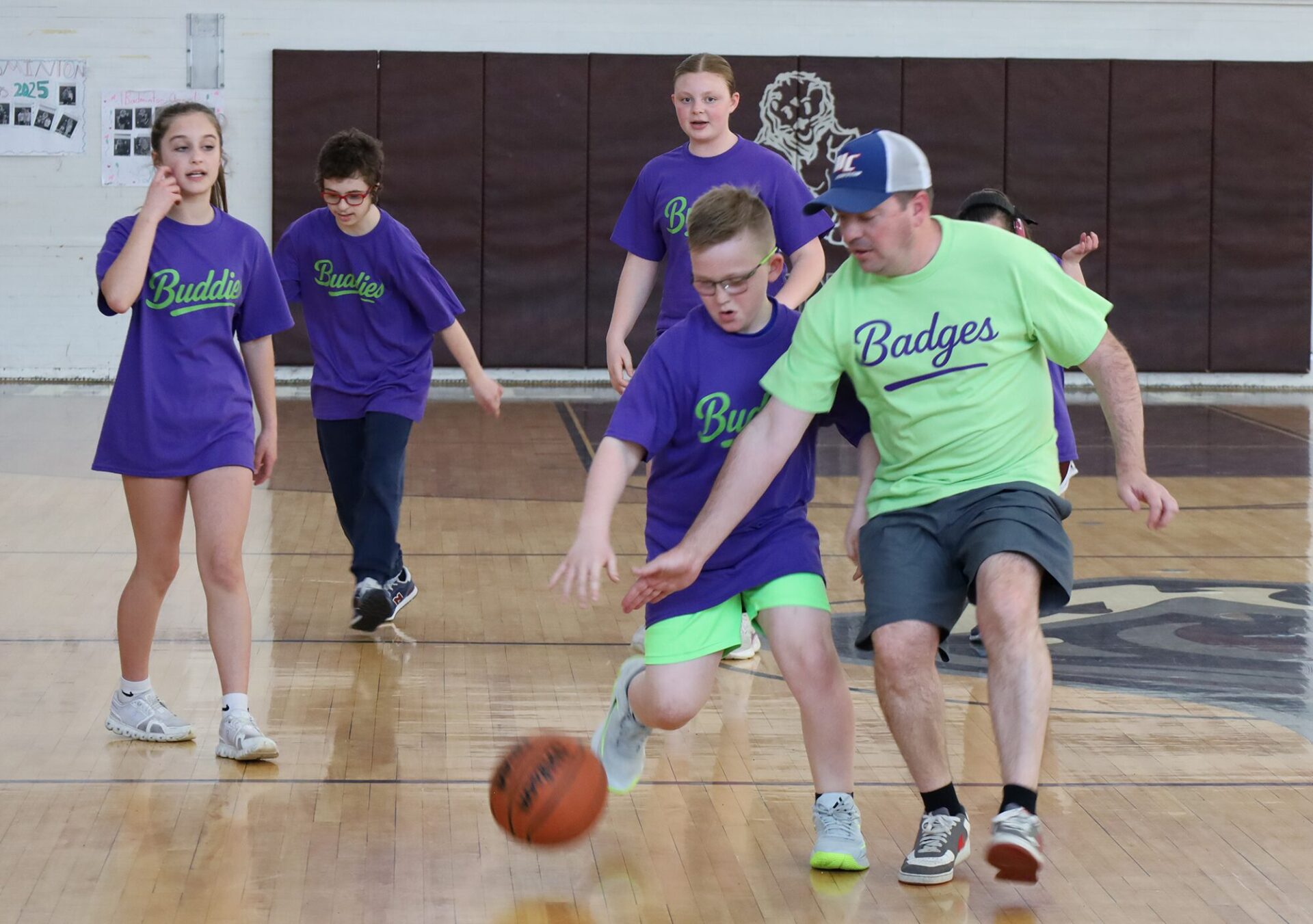 Action from the second annual Buddies vs. Badges charity basketball game on April 16, 2026.