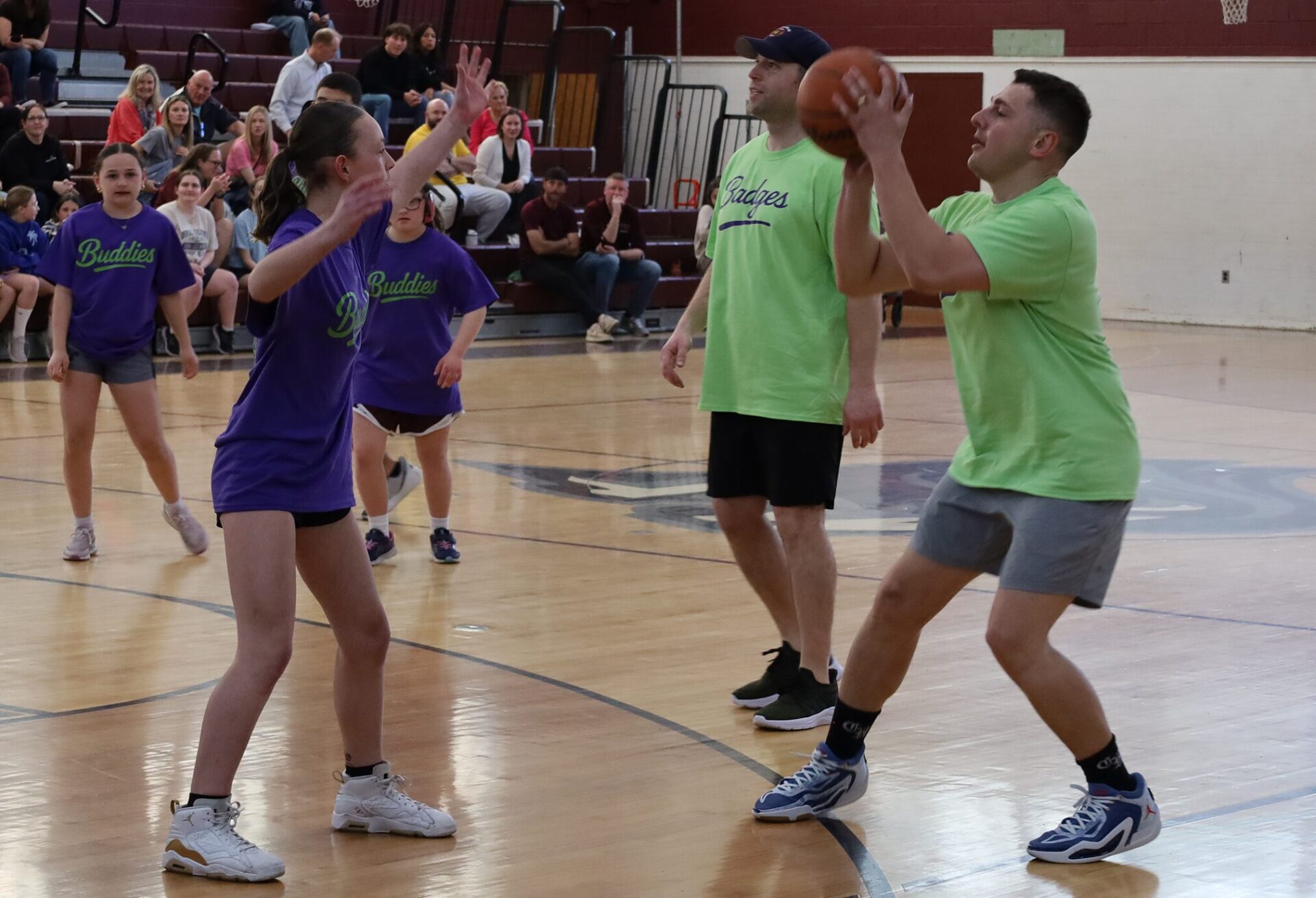 Action from the second annual Buddies vs. Badges charity basketball game on April 16, 2026.