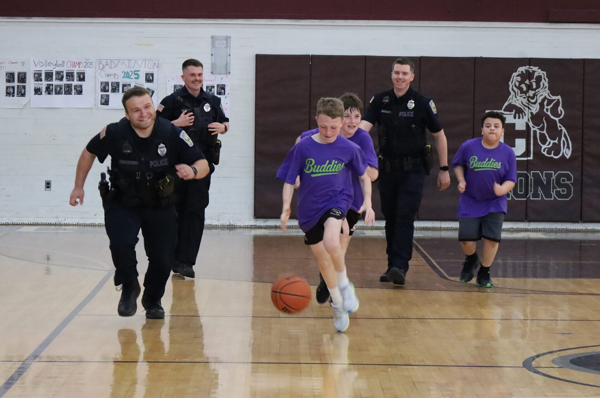 Action from the second annual Buddies vs. Badges charity basketball game on April 16, 2026.