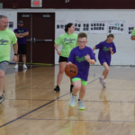Action from the second annual Buddies vs. Badges charity basketball game on April 16, 2026.