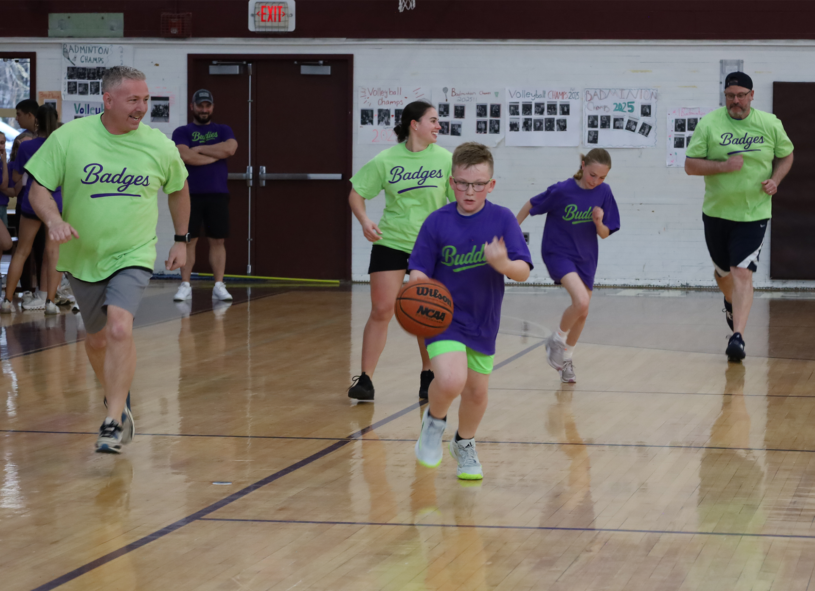 Action from the second annual Buddies vs. Badges charity basketball game on April 16, 2026.