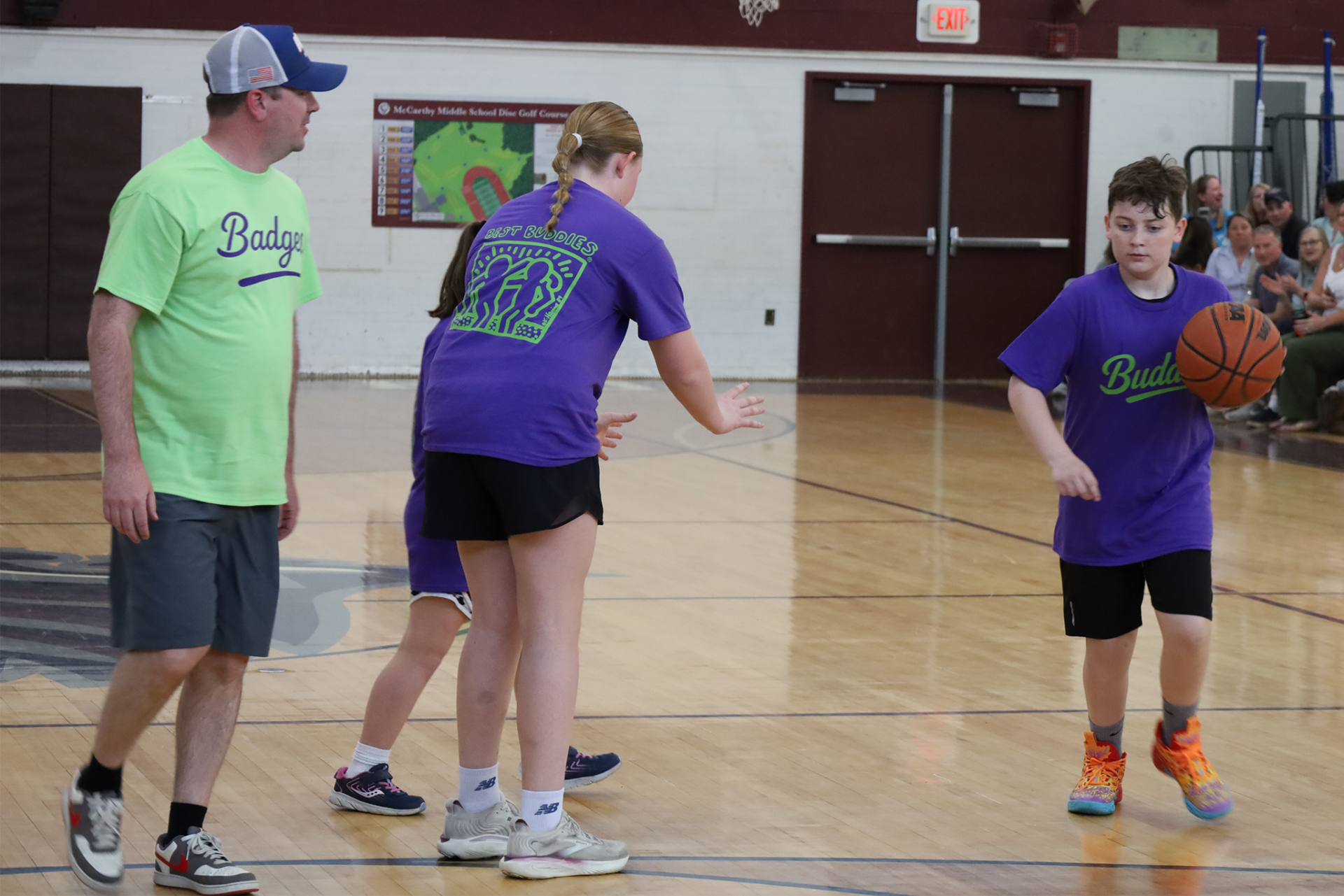 Action from the second annual Buddies vs. Badges charity basketball game on April 16, 2026.