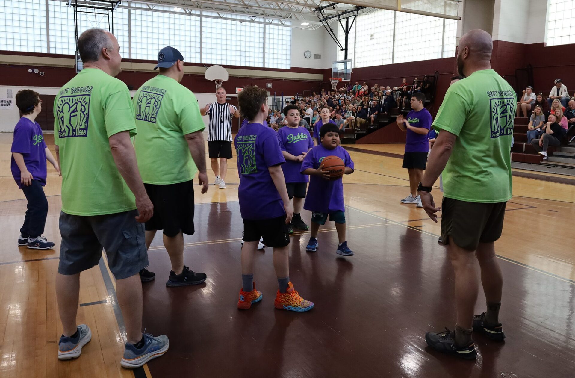 Action from the second annual Buddies vs. Badges charity basketball game on April 16, 2026.