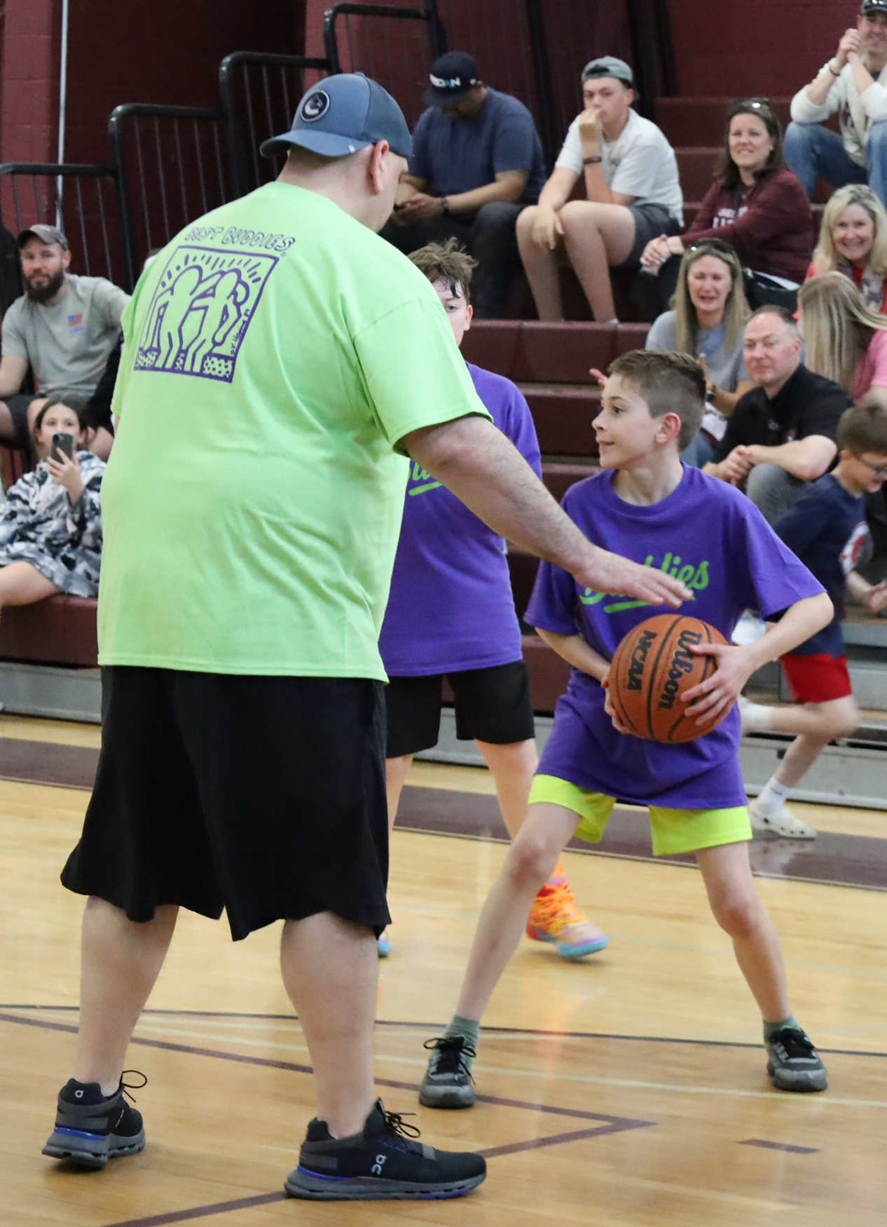 Action from the second annual Buddies vs. Badges charity basketball game on April 16, 2026.
