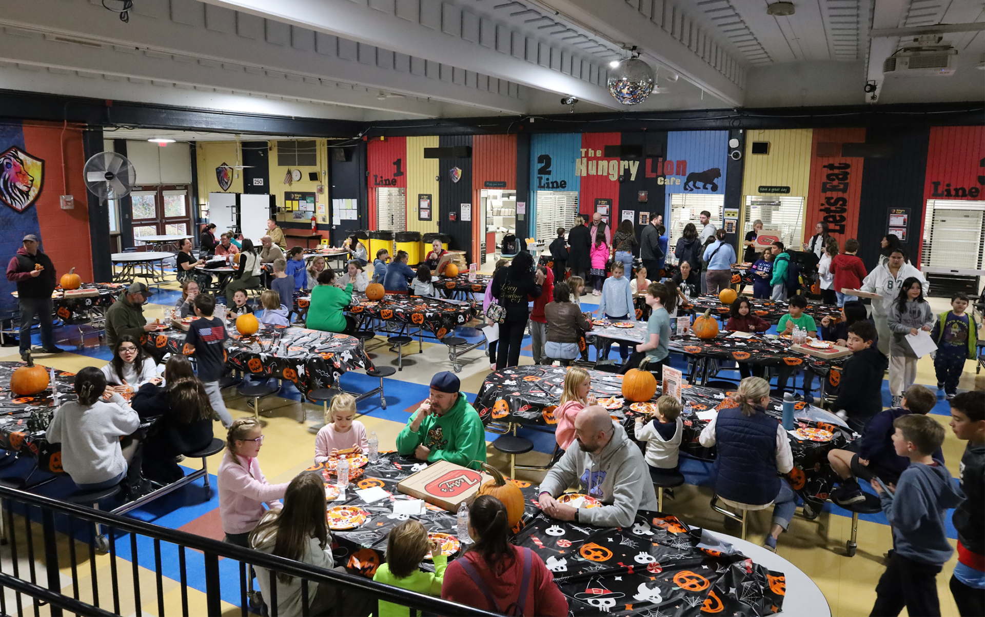 Parker Pizza, Paperbacks and Pumpkins Students and their families attend the annual Pizza, Paperbacks and Pumpkins event at Parker Middle School on Wednesday, Oct. 21, 2026.