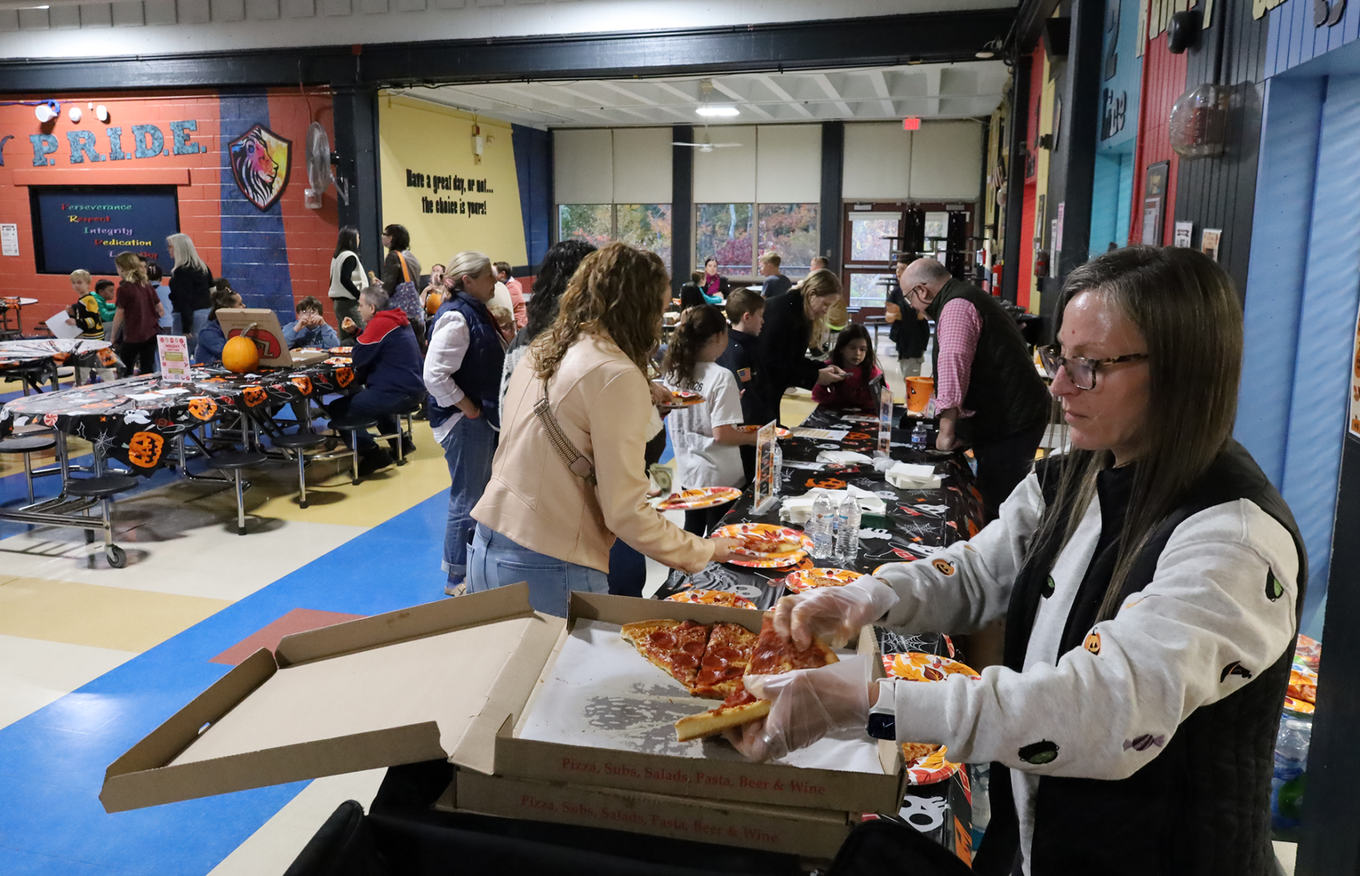 Parker Pizza, Paperbacks and Pumpkins Students and their families attend the annual Pizza, Paperbacks and Pumpkins event at Parker Middle School on Wednesday, Oct. 21, 2026.