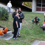 Students and their families attend the annual Pizza, Paperbacks and Pumpkins event at Parker Middle School on Wednesday, Oct. 21, 2026.