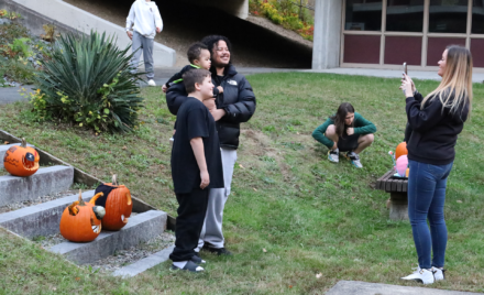 Students and their families attend the annual Pizza, Paperbacks and Pumpkins event at Parker Middle School on Wednesday, Oct. 21, 2026.